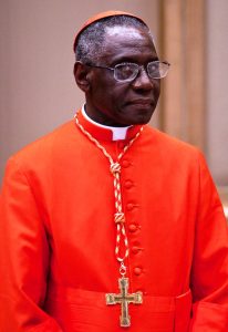 Newly appointed cardinal Robert Sarah, Archbishop Emeritus of Conakry in Guinea and president of the Pontifical Council, poses for a photo during the courtesy visits at the Hall of Benedictions in the Apostolic Palace. Vatican City, November 20, 2010.
